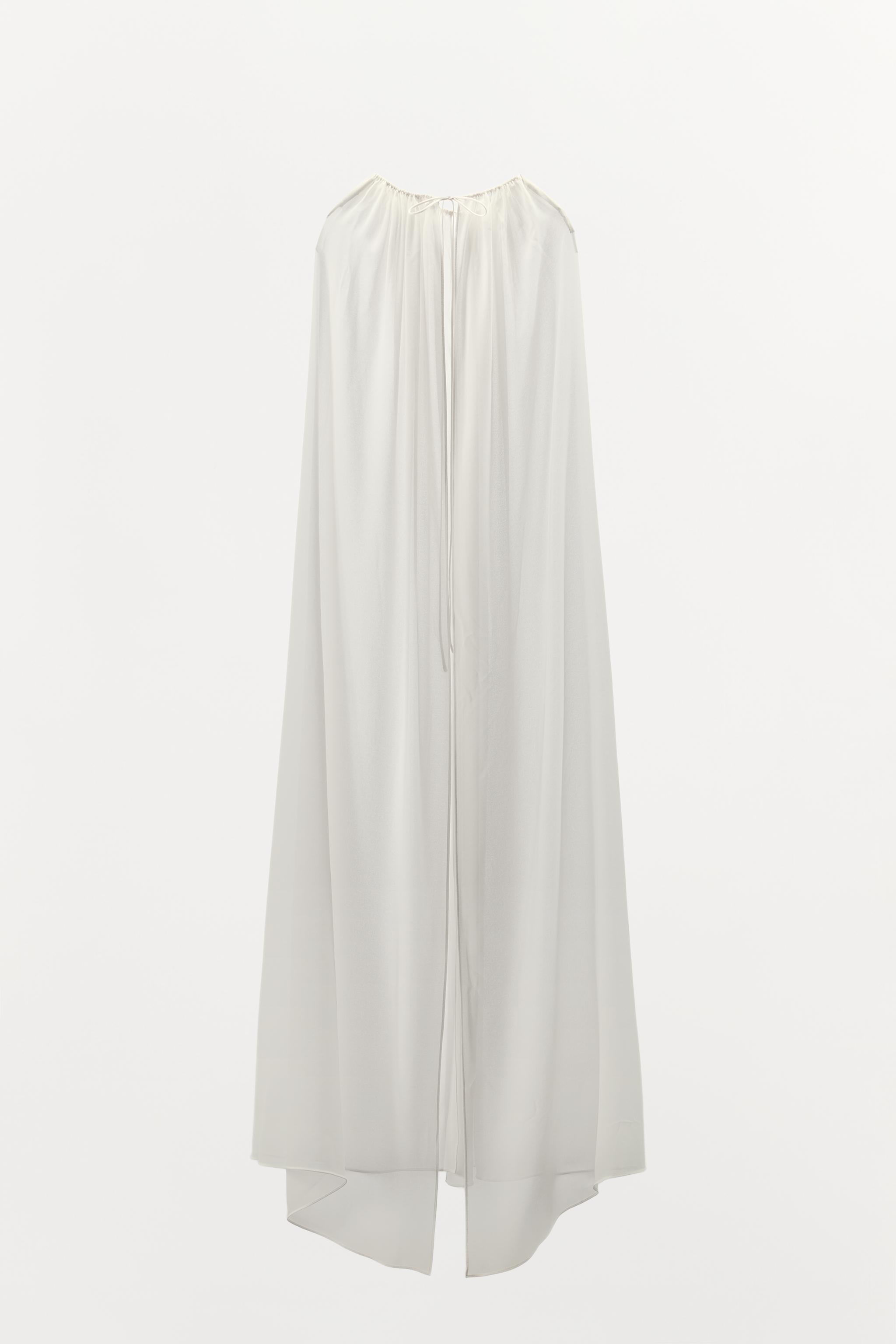 ASYMMETRIC LONG CAPE